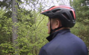 man on bicycle in park